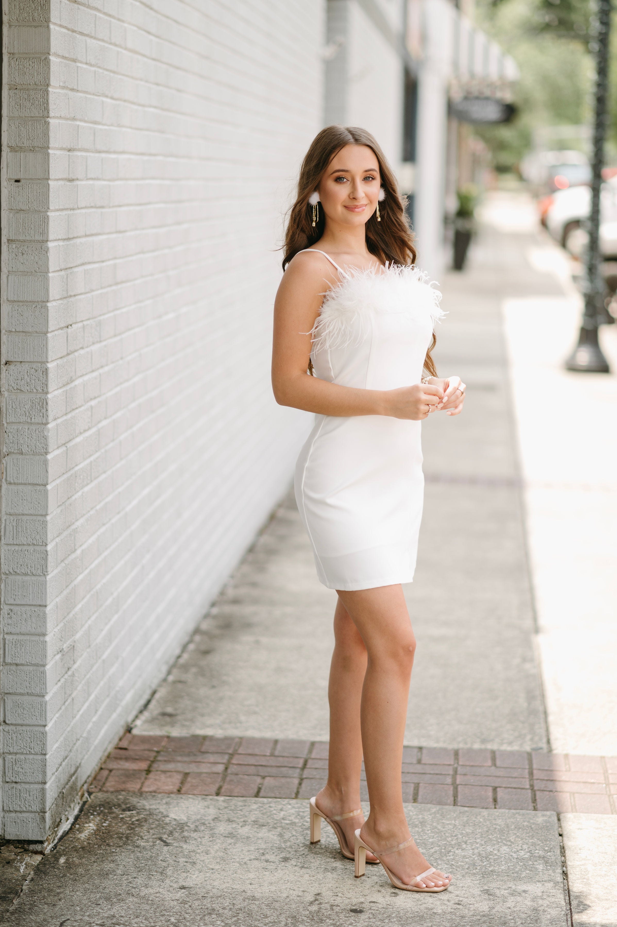 white fitted dress in store The Evette White Zip Front Midi Dress main image 0